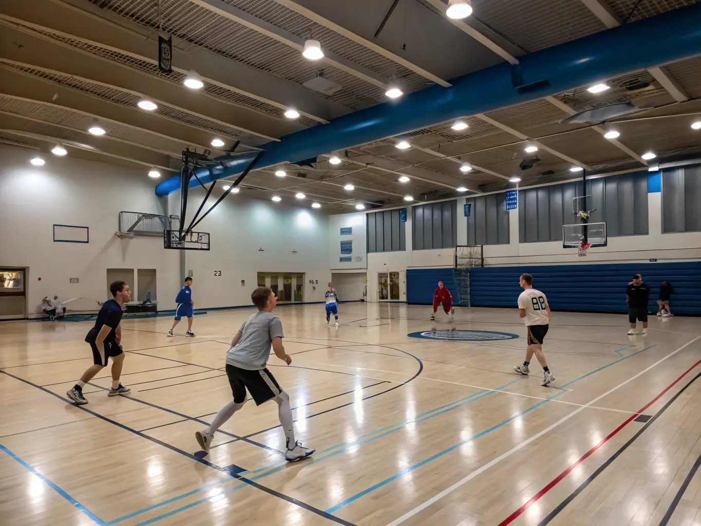 A vibrant image depicting a group of diverse individuals participating in a basketball game at an indoor court, showcasing teamwork and active engagement.
